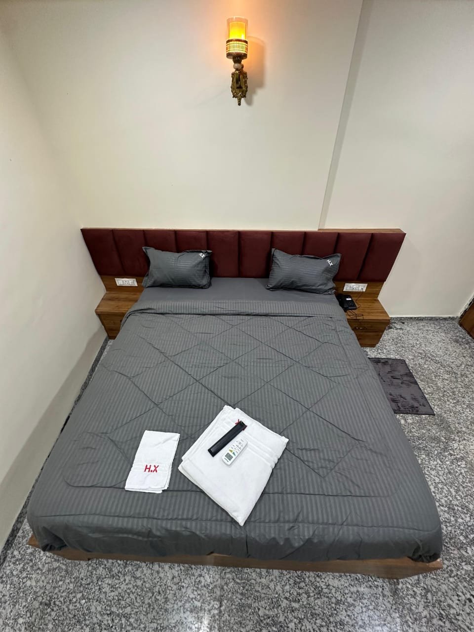 King bed made up with fresh linen and towels