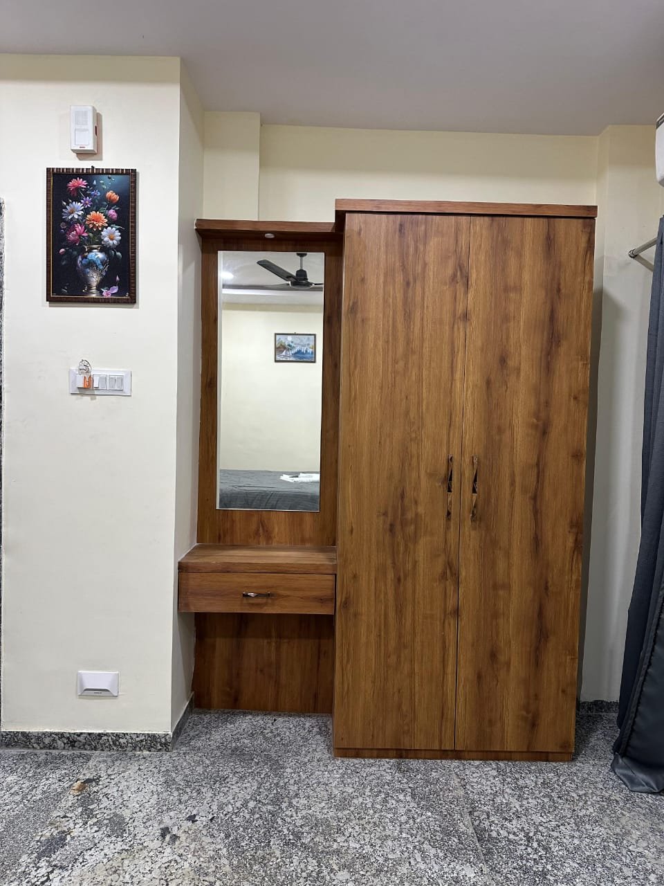 Wardrobe and dressing mirror in guest room